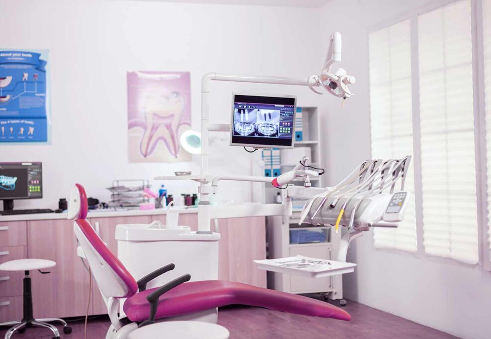dental-chair-other-accesorries-used-by-dentist-empty-cabinet-stomatology-cabinet-with-nobody-it-orange-equipment-oral-treatment